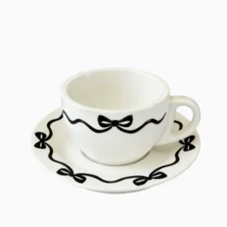 Порцелянова чашка з блюдцем у французькому стилі з декоративними бантиками