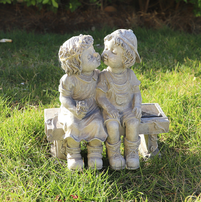 Декоративна садова статуетка «Діти на лавці» із смоли